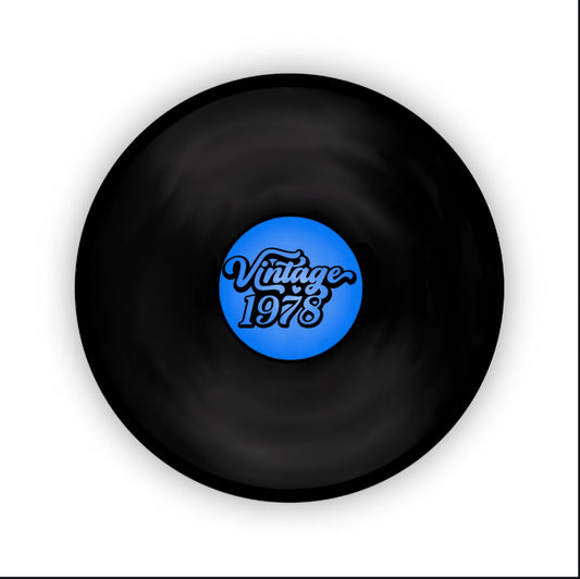 Close-up view of the Vintage 1978 Vinyl Sticker highlighting the vibrant blue label and eye-catching design, ideal for vinyl lovers.