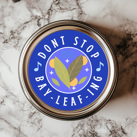 A round sticker with a blue background featuring the text 'DON'T STOP BAY-LEAF-ING' and an illustration of a bay leaf and musical notes.