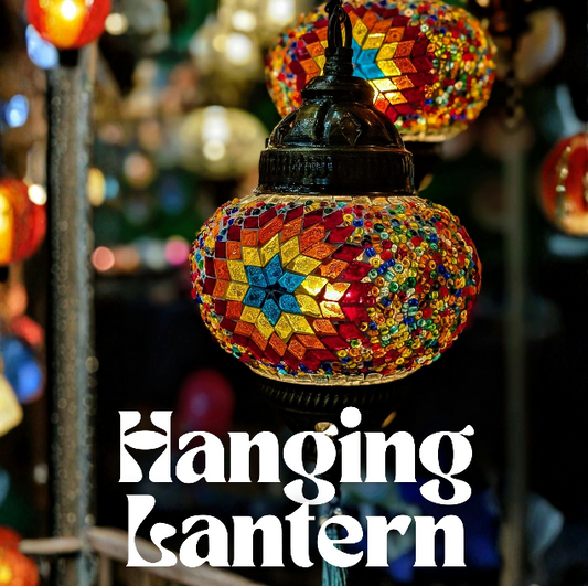 Colorful mosaic hanging lantern with blurred lights in the background