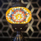 Close-up of Golden Star Turkish Mosaic Lamp, featuring intricate star patterns and a vibrant mosaic of colorful glass.